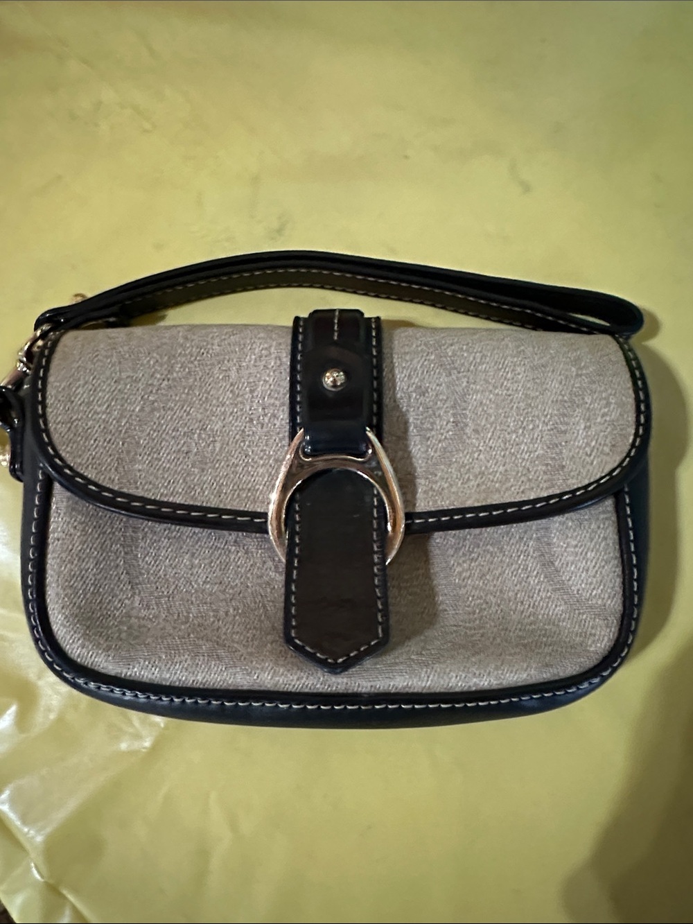 Dooney & Bourke Vintage Tan Canvas Flap Wristlet with Brown Trim